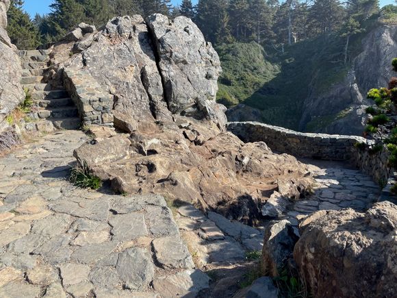 There is a series of steps made out of rock that leads up to the top of Wedding Rock