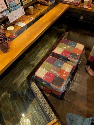 This is where we sat, tiled foot bath in front of us.  Cups on tea on the counter