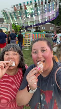 Eating zeppolis at a carnival is our favorite part