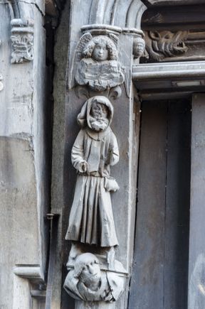 This moneylender @#12 stands atop a debtor. Note the similarity between the message of our modern political cartoons and this 3D commentary from centuries past!