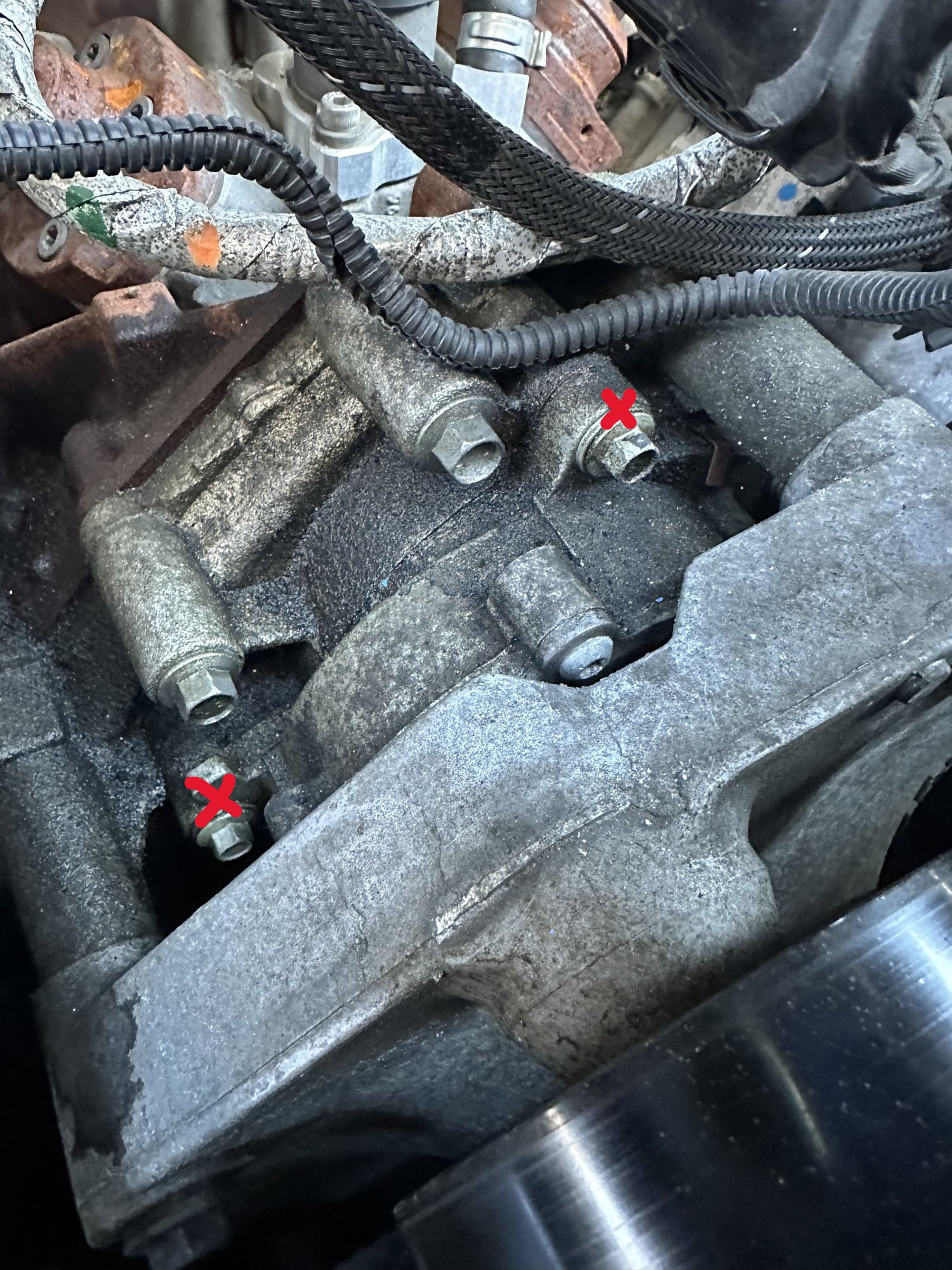 Loose vacuum pump bolts seem to be a common issue on these trucks. Should be accessible for most by removing the intake pipe.