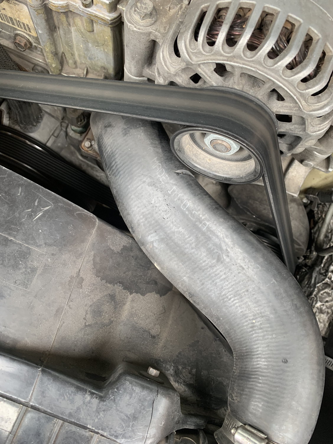 Upper radiator hose collapsed rubbing on alternator pulley Ford Truck