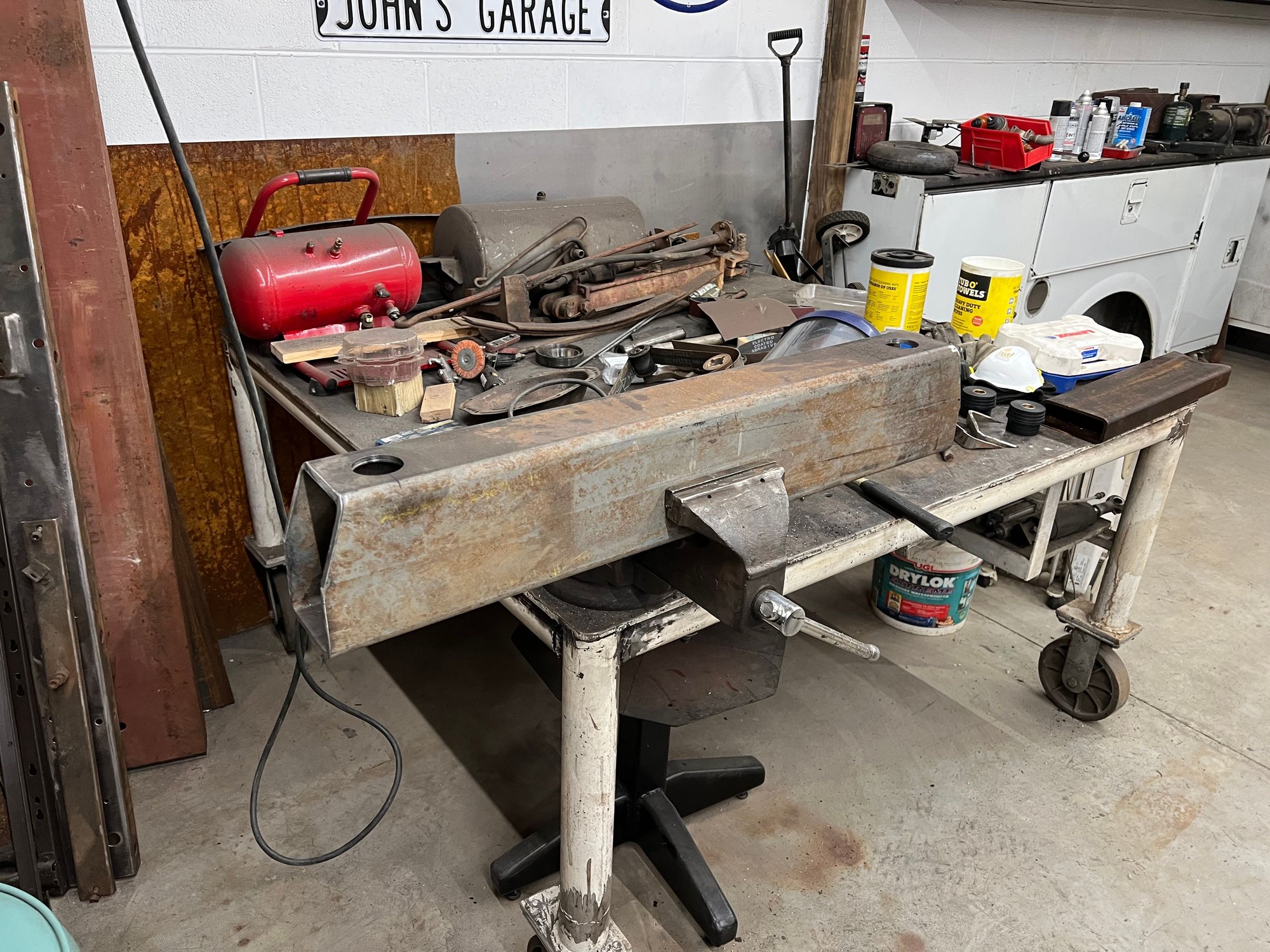 Cut some 1 and 3/4 inch holes in the top of the 4 inch wide part at 28 inches on center. The bushings have a 1 and 1/2 inch piece that locks  the two halves together. That should make alignment easier.