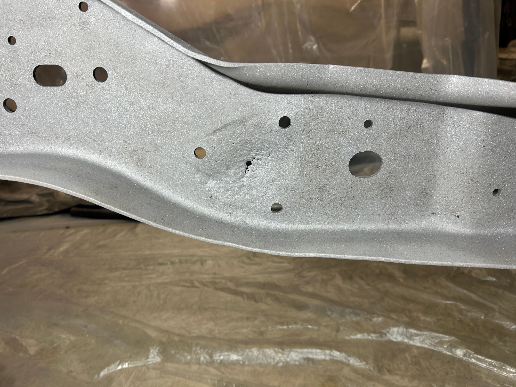 Rear shock mount rust pitting