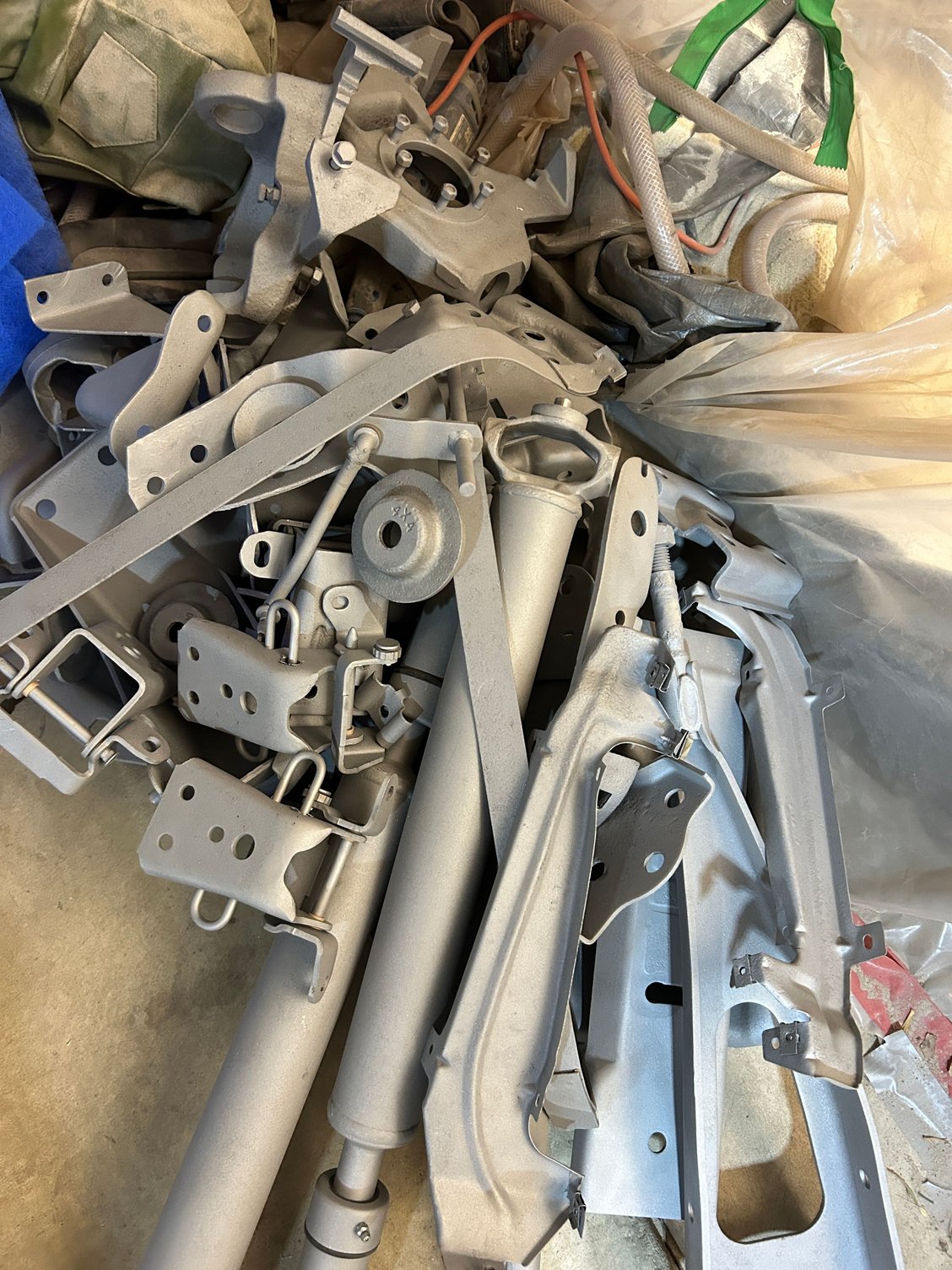 mess of freshly blasted parts