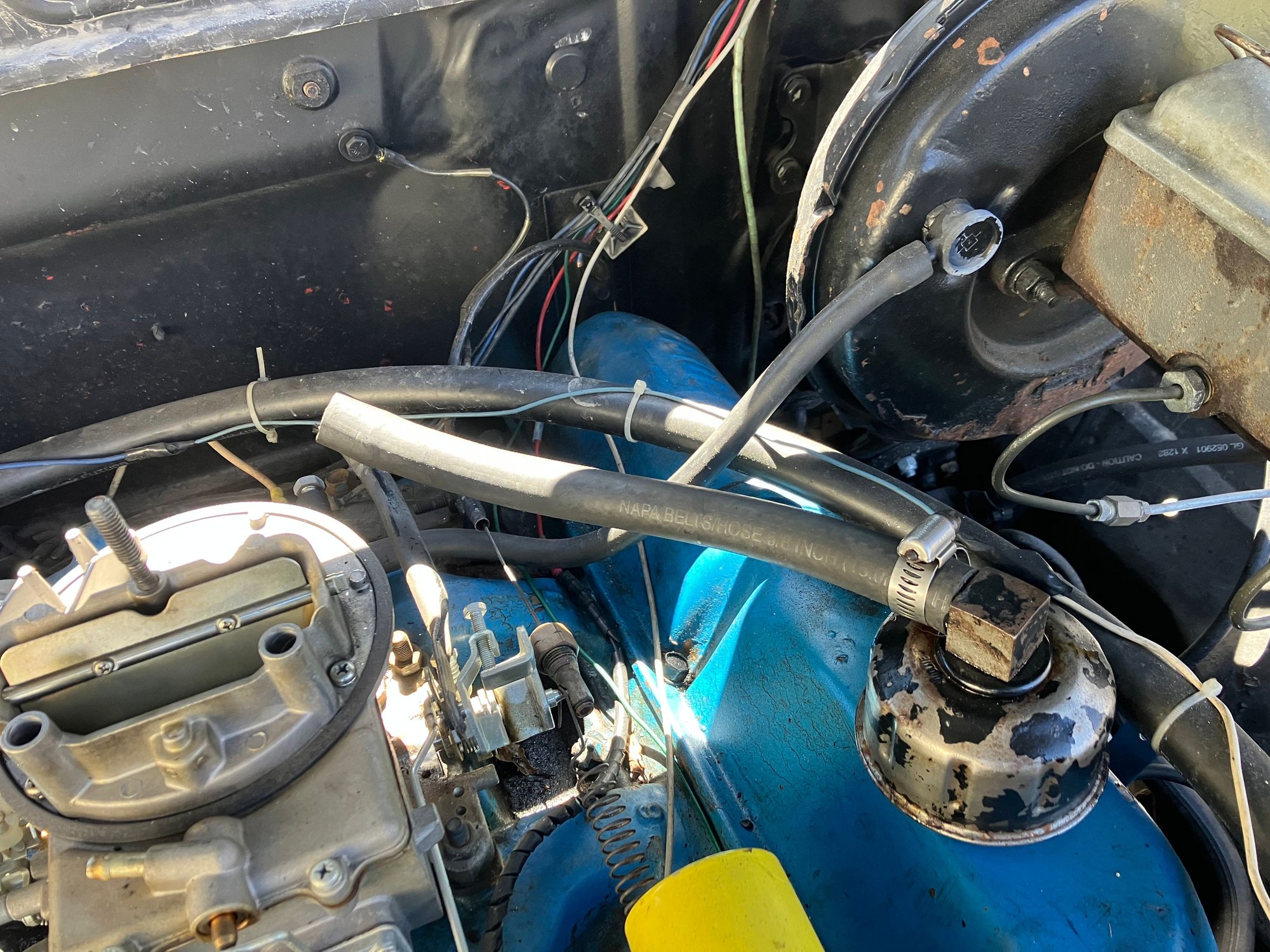 this hose was longer originally b4 I changed config. But went behind carb to firewall.(OG RIGHT)