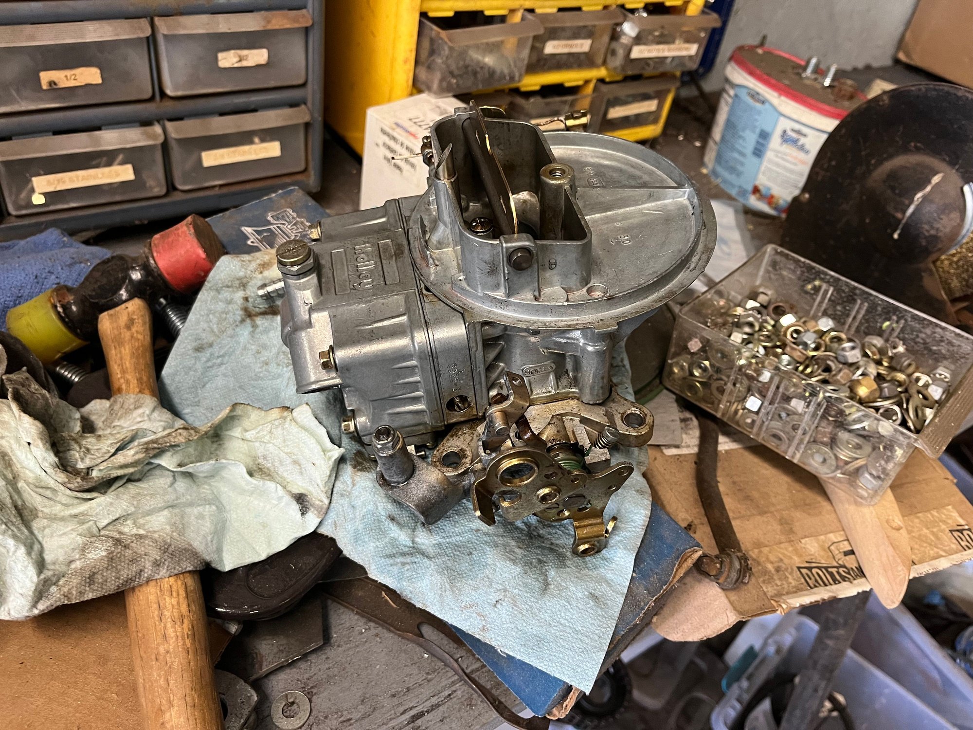 I didn't do anything to the carburetor as the Holley 500 has been working great, but I did put in a pot with some kerosene and scrub the funk off with a toothbrush.