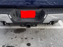 2 lights on middle of bumper and 2 down on trailer hitch