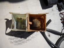 What's left of the washer and coolant reservoir.