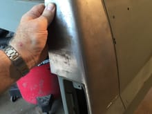 Repairing some damaged sheet metal.