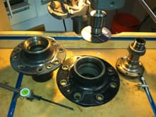 I chucked up a metal blade on the drill press and mounted the hub upside down on a spindle to rotate the hub into the blade and relief enough from the back of the hub to accommodate the new disc
