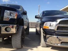 McGaughys 6 1/2&quot; lift w/ procomp AAL &amp; shims next to stock 2012 dodge ram 1500 2wd.