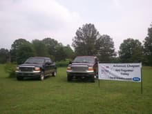 Mine and Dave's truck next to the new banner