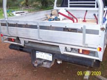 Tray rear and solid steel heavy duty tow bar.