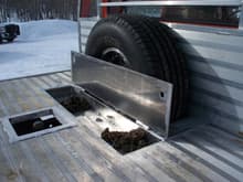tool box recessed, spare tire carrier.