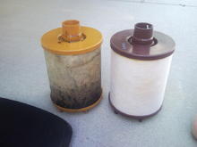 Old filter after 1 year along side new replacement filter