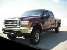 1999 Crew Cab PowerStroke
Leveling Kit 
BullyDog 6 position Chip
Straight Exhaust with 8 inch tip
