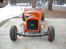 1923 Dodge body on a home made frame powered by a 300 I 6 with a top loader 4 speed and a 8 inch limited slip rear end. The Mopar guys give me hell for that combo.