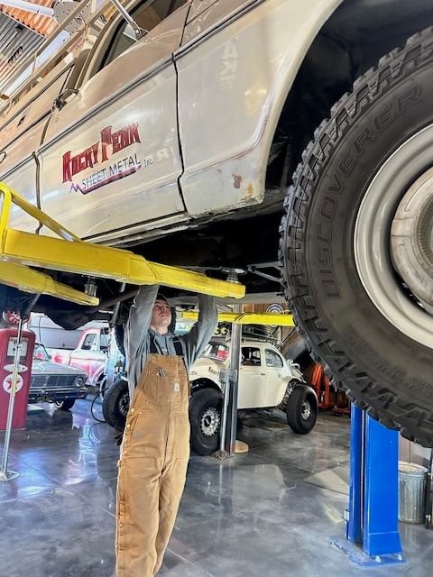 My Son Landon Helping to hang some exhaust components. 