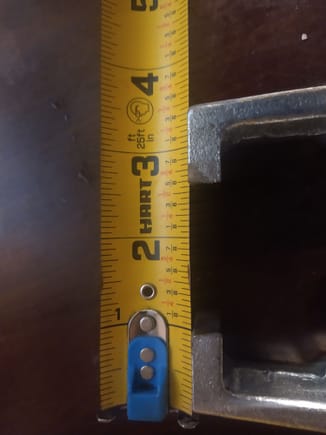 After grinding away a bit, I ended up at a 1 and 9/16 inch opening at the top. This was enough to where you just barely missed the splines of the steering gear sector shaft but are close enough to it that you still have plenty of meat grabbing the pitman arm.