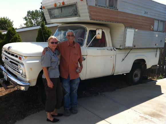 Couple next to truck