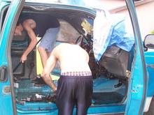 Boys Hard at work removing all the interior