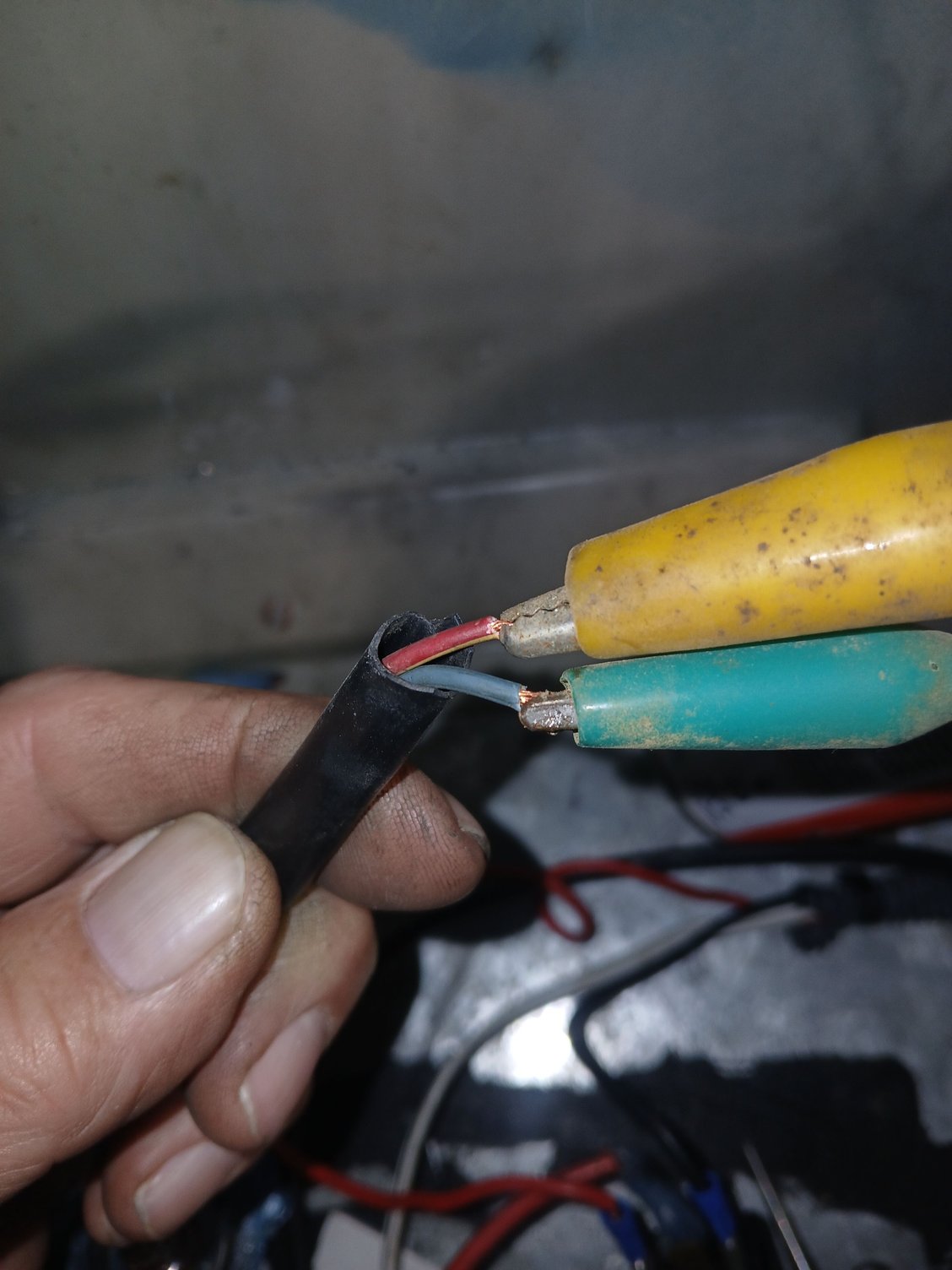Harness inside the trunk from the harness Ive tapped into. Note: No black wire here like the bulbs have.