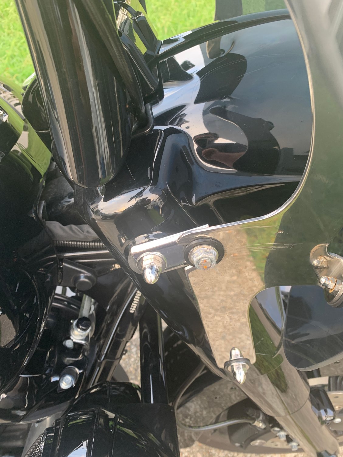 Modifying your windshield/brackets to fit with apes on your Road King
