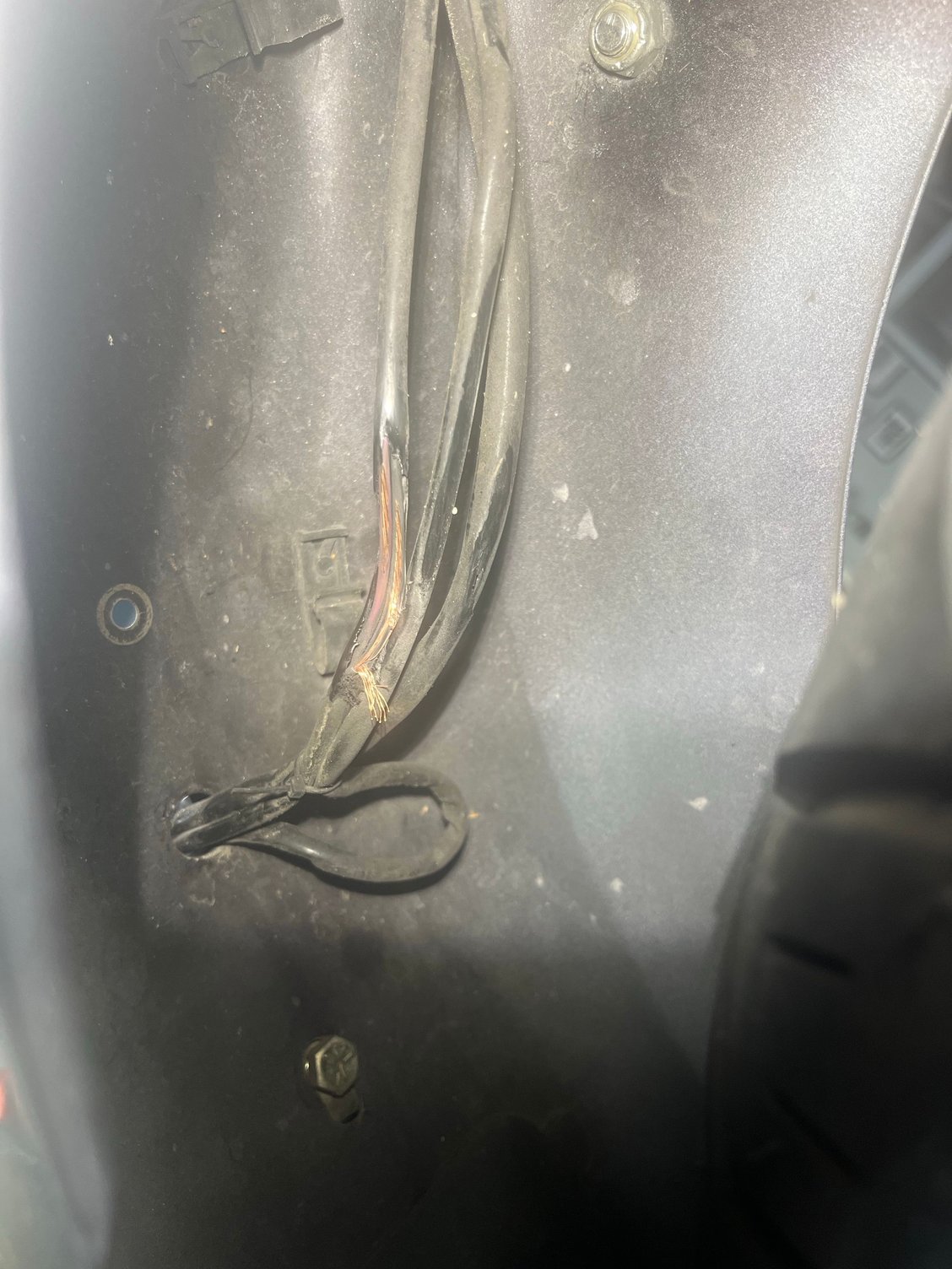 Previous owner Nightmare wiring…. Taped up with masking tape  aftermarket turn signals 
