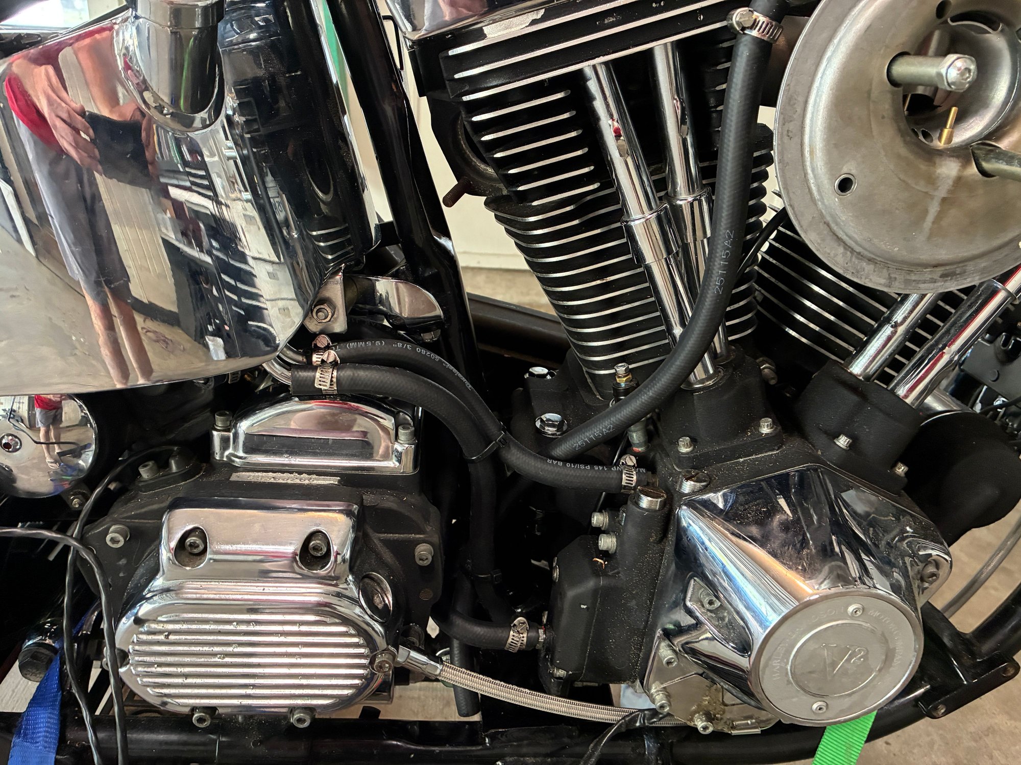The other line is the drain for the head breather system. 