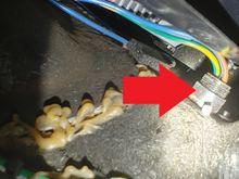 Brown cable goes down through fairing along with two battery cables