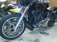 2000 mile update. ..Bassani, fp3, K&N, progressive 970 shocks, progressive front  springs, super bike bars, H-D 1/4 , la pera seat, I couldn't be happier with her. A great bike from the factory but set up properly. ..fucking amazing.