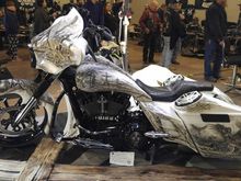 The airbrushing on this bike tells the story of the crucifixion of Jesus from the front to his resurrection at the other end. Amazing airbrushing