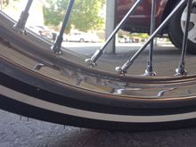 The left over adhesive from my front rim, as it does have on the back as well.