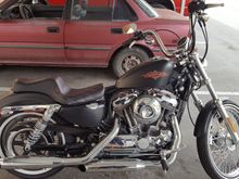 This is my sportster. All stock except the seat and now the passenger mounting kit . Next will be some joker footpegs and a burley sissy bar w a backrest