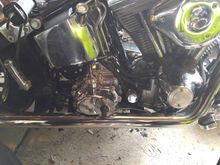 I had to dimple the front pipe to fit under the kicker housing.