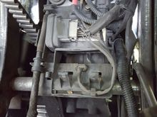 Main Circuit breaker location. The breaker has a red wire and a two yellow wires on it, towards the top of the photo.