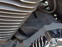 Then i did some looking around and noticed this hose that does not connect to anything. And noticed some residue next to it. Is this the hose that removes oil when it is overfilled?