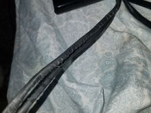 You can see here that the heat shrink got skinned up every step of the way diring the pull. You can also see the corner i was talking about that is razor sharp on the inside. 