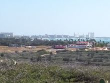 View from the California Lighthouse of the hotel district of the island.