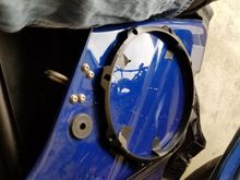 using the speaker bracket as a template for the holes and cutting