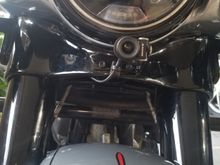 Fron view of front camera, not very noticable.  Lots of room so will not contact fender.  Good centered unobstucted view to front.