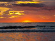 Now you can see the sun peaking up over the horizon. Simply beautiful. I envy those that get to see this daily!