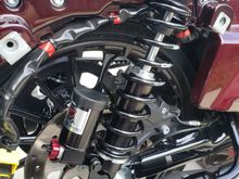 Not sure about the stockers but the RWD's I just put on had to be mounted upside down on touring bikes for bag clearance, seemed weird to me but I called RWD and they confirmed upside down was correct and has zero impact what so ever on performance.
​​​​​​​