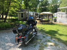My camper. Creek runs behind it. Spending an extended holiday weekend here. Riding the back country roads all day long for the last few days. 