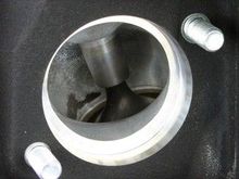 WHAT YOU SEE THERE, WAS A CHUNK OF WELDED ALUMINUM AT ONE TIME, NOW YOU SEE IT GOES INSIDE, ITS NOT TOTALLY OPEN. AGAIN, IVE LEARNED ALOT ON ENGINES...MORE IS NOT ALWAYS BEST...