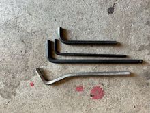 The "special tools" I used.  The top and bottom allen wrenches are ones I modified to reach the screws holding the intake to the heads.