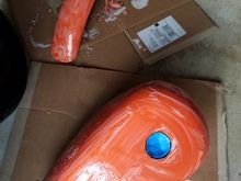 Tins with acid peel to remove paint