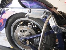 Homemade SS brackets to lower saddlebags about 2" as there was to much room between the top of the pipe and the bottom of the bag.