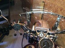 Lighter outlet is Harley part, phone mount is Ram sold by a company named Leader, or something like that.